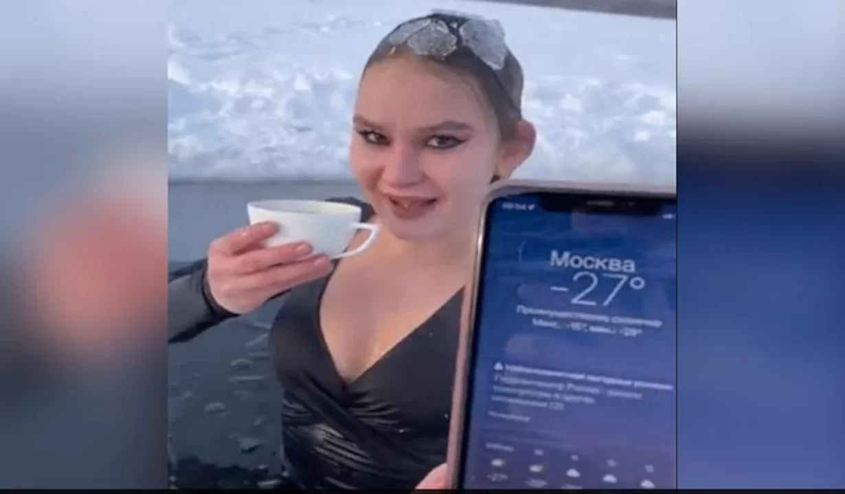 Viral Video Shows Woman Taking A Dip In Freezing Water, Then Drinking Coffee To Fight Cold